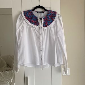 White floral blouse